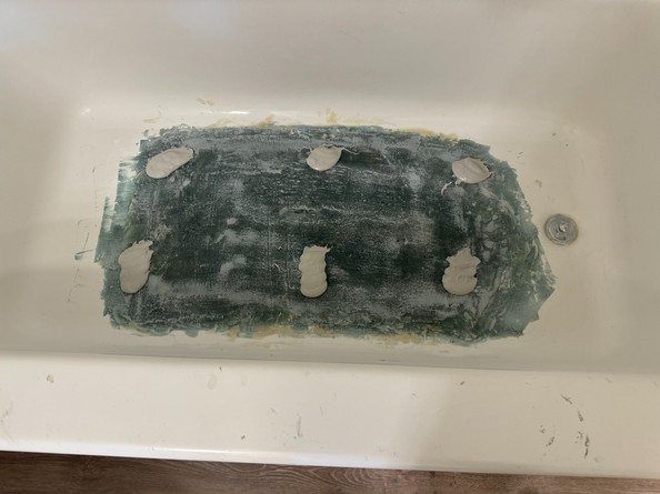 Fiberglass restoration stage of bathtub repair